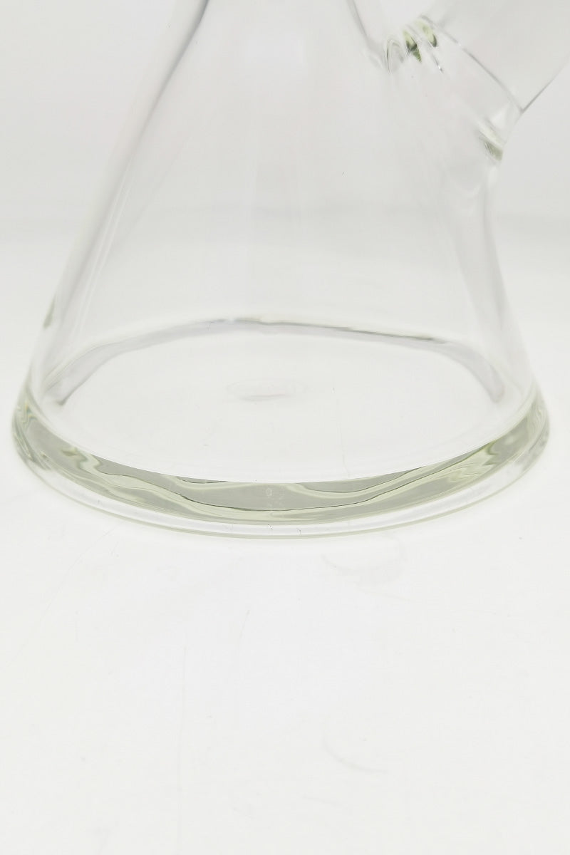 Close-up of TAG 30" Beaker Base 50x9MM in clear borosilicate glass, thick wall design - Rasta color accent.