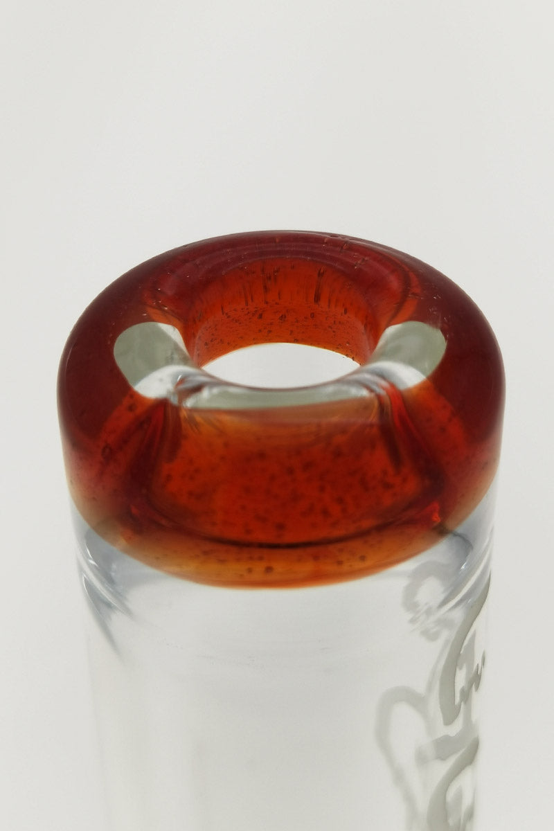 Close-up of TAG 7" Beaker's amber-colored fixed showerhead downstem top view