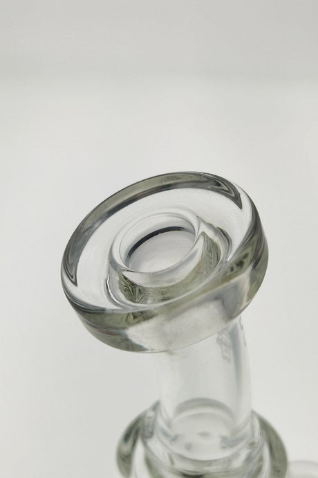 Close-up view of TAG 7" Mini Klein Bong's 10mm female joint with super slit puck percolator