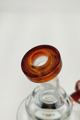 Close-up of TAG 8" Bent Neck Dab Rig with Amber Bellow Ball and Clear Base