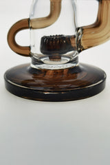 Close-up of TAG 8" Super Slit Puck Klein Incycler base with clear glass and sturdy design