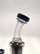 Close-up of TAG 8" Super Slit Puck Klein Incycler's 14MM Female joint with sturdy 4mm glass
