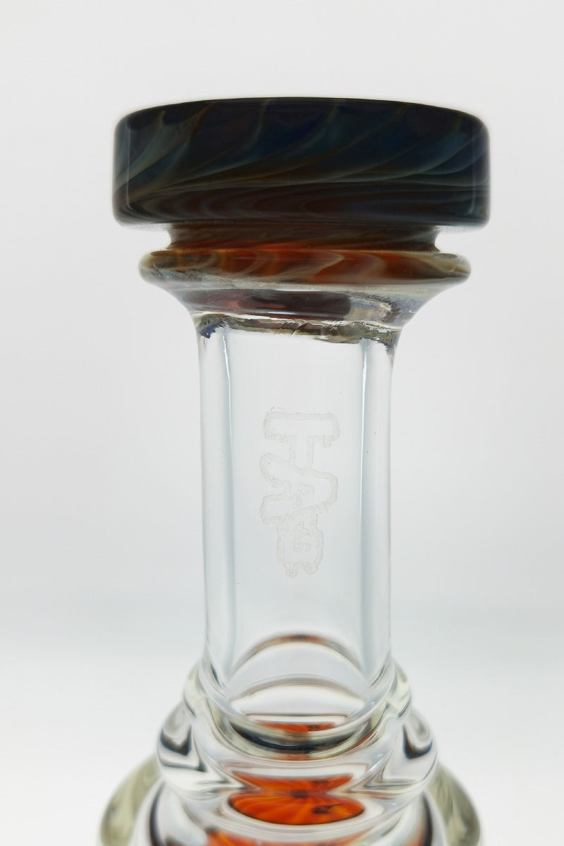 Close-up view of TAG 8" Super Slit Puck Klein Incycler neck with logo on clear quartz
