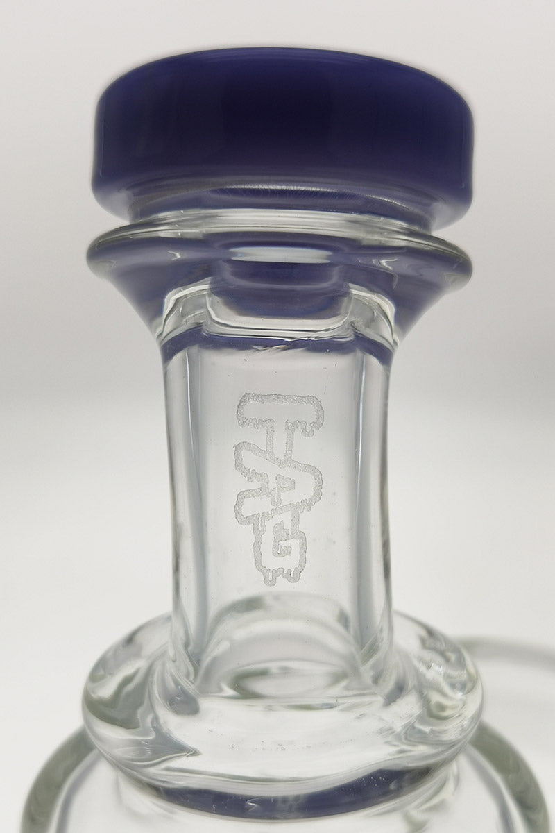 Close-up of TAG 9" Super Slit Donut Dual Arm Recycler joint with logo and purple accent