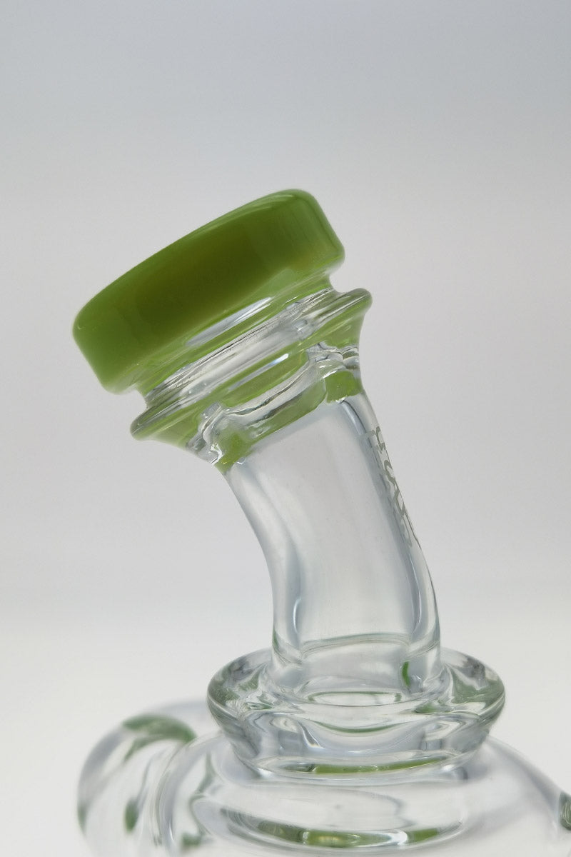 Close-up view of Thick Ass Glass 9.5" Quartz Recycler with green accent on 14MM Female joint