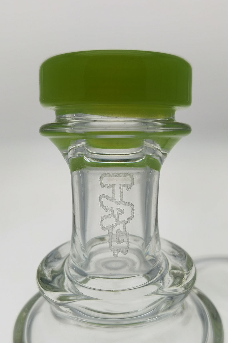 Close-up of TAG 9.5" Super Slit Donut Dual Arm Recycler's 14MM Female joint with TAG logo