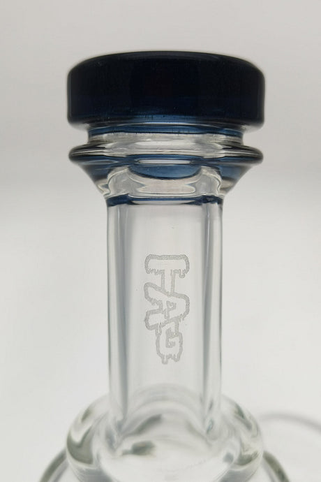 Close-up of TAG 9.5" Super Slit Donut Dual Arm Recycler's neck with logo, 14MM Female joint