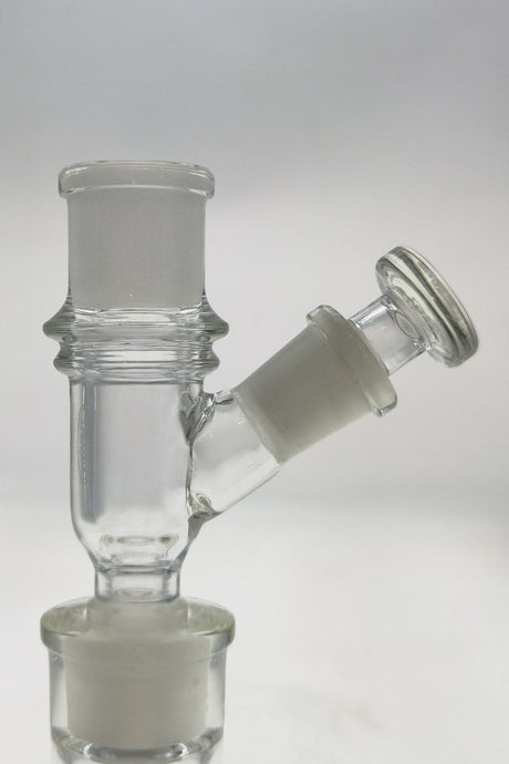 TAG - Female Adapter for Vaporizers with 10MM Carb, 14MM to 18MM size, Clear Glass, Angled View