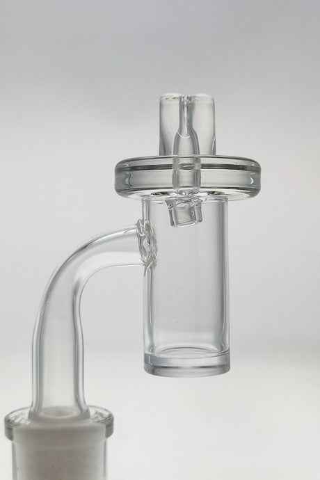 TAG Quartz Banger Carb Cap with directional air-flow and handle, clear view on seamless white background