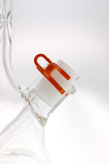 TAG - Orange Keck Clip for 18MM Thick Joint - Close-Up on Clear Bong