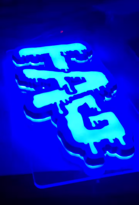 Thick Ass Glass LED Sign in Wavy Blue, Illuminated with Neon Glow, 290MM x 620MM Size