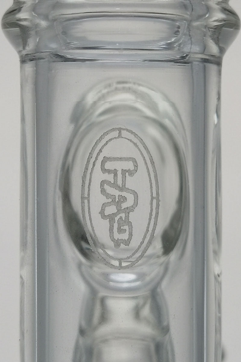 TAG logo on clear glass reclaim adapter with collecting dish for bongs, close-up view