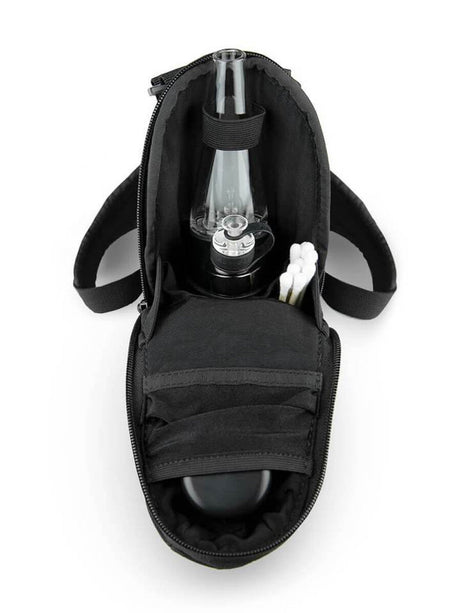 Puffco Peak Bag open view displaying dab rig, cotton swabs, and compartments