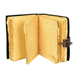 Tree Goddess Faux Leather Journal open to blank pages, showcasing rustic design and latch closure