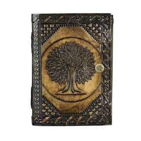 Tree of Life embossed leather journal with secure snap closure, front view on white background