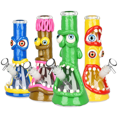 Colorful UV Reactive Maniacal Monster 3D Painted Beaker Bongs in blue, green, and yellow