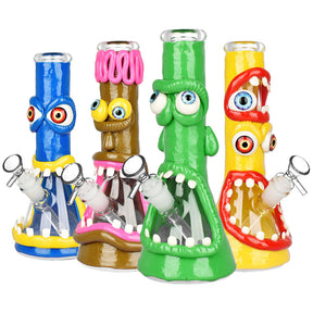 Colorful UV Reactive Maniacal Monster 3D Painted Beaker Bongs in blue, green, and yellow