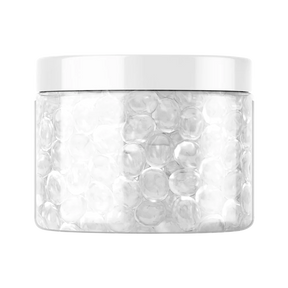 Close-up of White Rhino 6mm clear quartz terp balls in a 100pc jar, ideal for dab rig efficiency