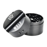 Wolf Grinders Combo Crusher in black, compact all-in-one cannabis kit, side view on white background