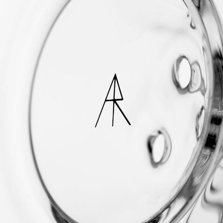 Close-up of MJ Arsenal logo on the Bloopcycler Dab Rig made from borosilicate glass