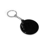 High Society Limited Edition Keychain - Black, Round, Textured Surface, Close-up View