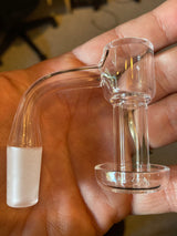 Helio Supply Galaxy Terp Slurper Set held in hand, clear glass, durable design, close-up view