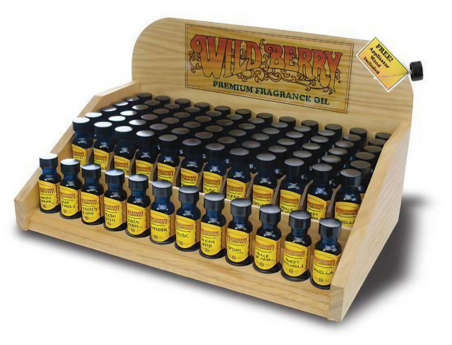 Wild Berry Incense Oils Starter Kit with 72 fragrances in an oak display rack, ideal for home decor
