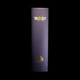 Myster 24k Stashtray Bundle in black leather with gold logo, front view on black background