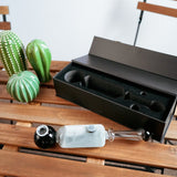 Freeze Pipe Steamroller with glycerin chamber, next to open box, on wooden surface