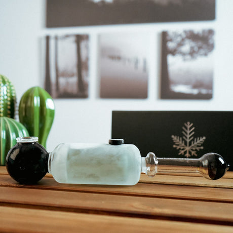 Freeze Pipe Steamroller with glycerin chamber for cool smoke, displayed on wooden surface