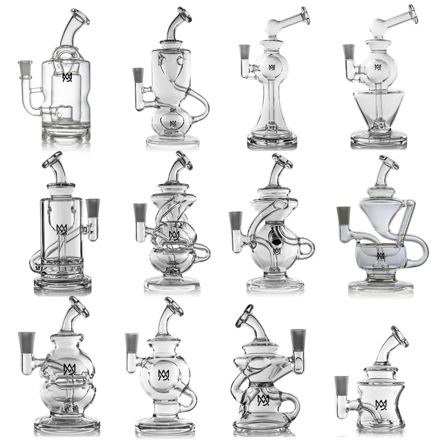 Assorted MJ Arsenal Mini Dab Rigs in various designs from the Collector's Pack, displayed on a white background