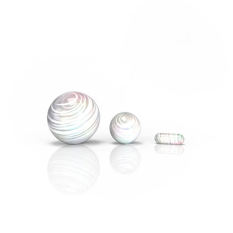 Honeybee Herb Dab Marble Sets in assorted colors, front view on reflective surface