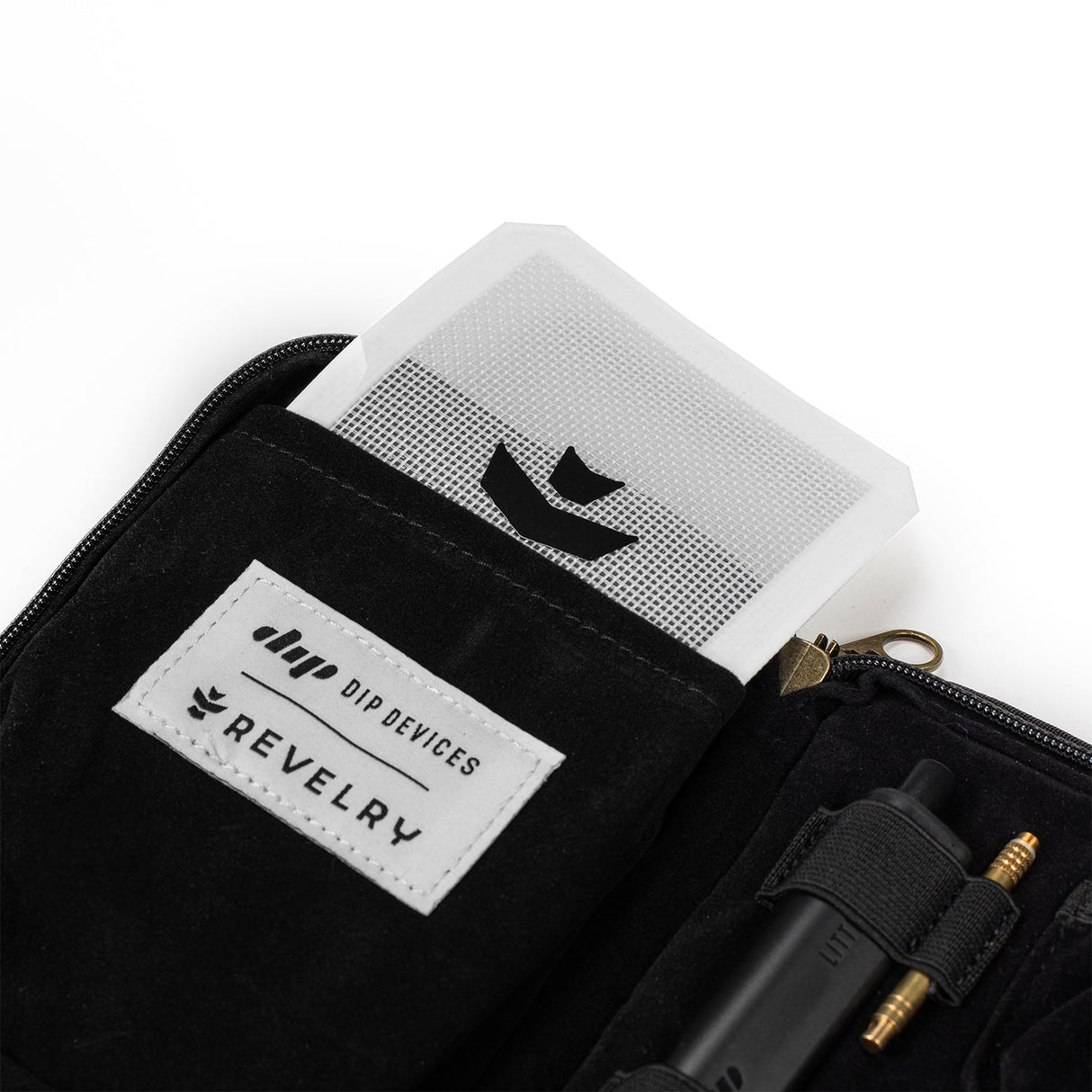 Revelry Supply's The Dab Kit open view displaying smell proof compartments and tools