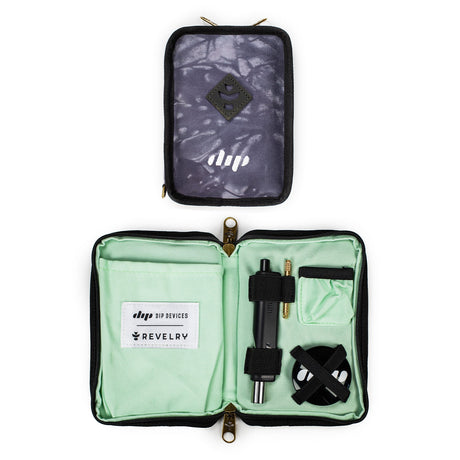 Revelry Supply's The Dab Kit in Tie Dye variant, smell proof, open view showing compartments