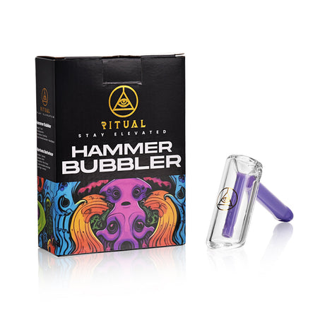 Ritual Smoke Hammer Bubbler in Slime Purple beside its packaging, angled view on white background