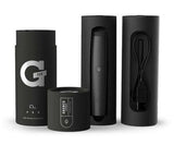 G Pen Pro Vaporizer by G Pen displayed with USB charger and cleaning brush, front view