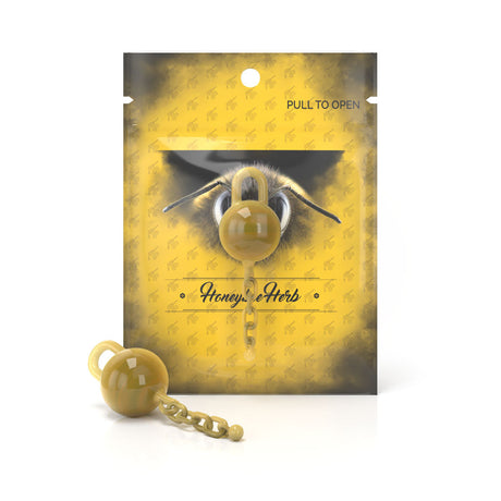 Honeybee Herb Glass Terp Chain in yellow, front view on branded packaging, ideal for dab rig customization