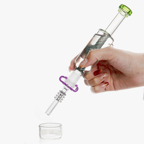 Hand holding PILOT DIARY Glycerin Wig Wag Dab Straw with detachable tip, clear view