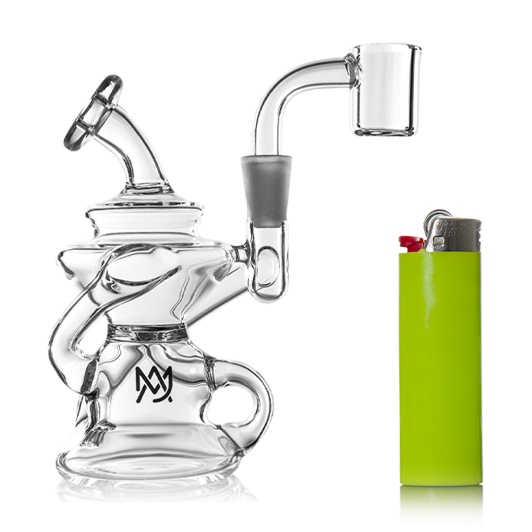 MJ Arsenal Hydra Mini Dab Rig with clear glass and a 90-degree banger hanger, next to a green lighter