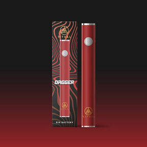 Ritual Dagger 510 Red Variable Voltage Pen Battery with packaging on a dark background