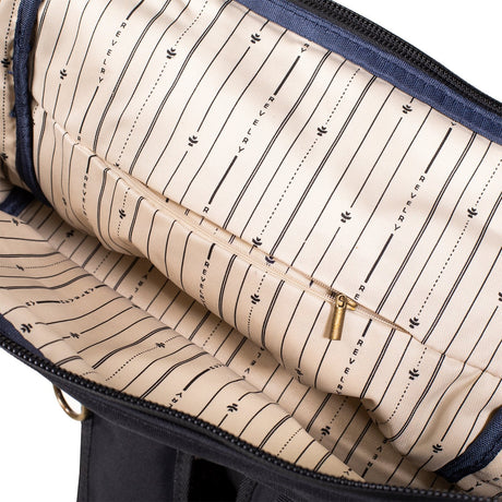 Revelry Supply The Drifter Smell Proof Backpack open view showing interior pattern and pockets