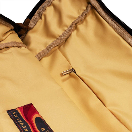 Close-up of Revelry Supply The Drifter Smell Proof Rolltop Backpack with zipper detail