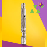 DynaVap 'The "M" Plus' vaporizer on a vibrant yellow and purple background, angled view