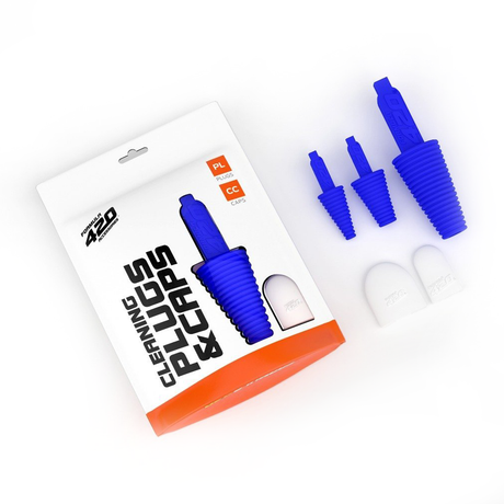 Formula 420 Cleaning Kit with blue plugs and caps on white background, top view