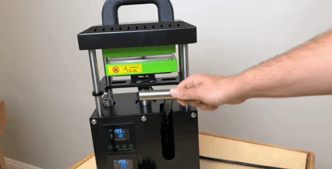 Rosin Tech BIG Smash™ - Black Steel Desktop Rosin Press in use, side view with digital display