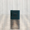 Helio Supply SolPod Express Kit in Navy Blue, compact vaporizer front view on reflective surface