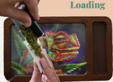 KronicBlade from Happy Kit - Close-up of herb grinder in action with colorful tray