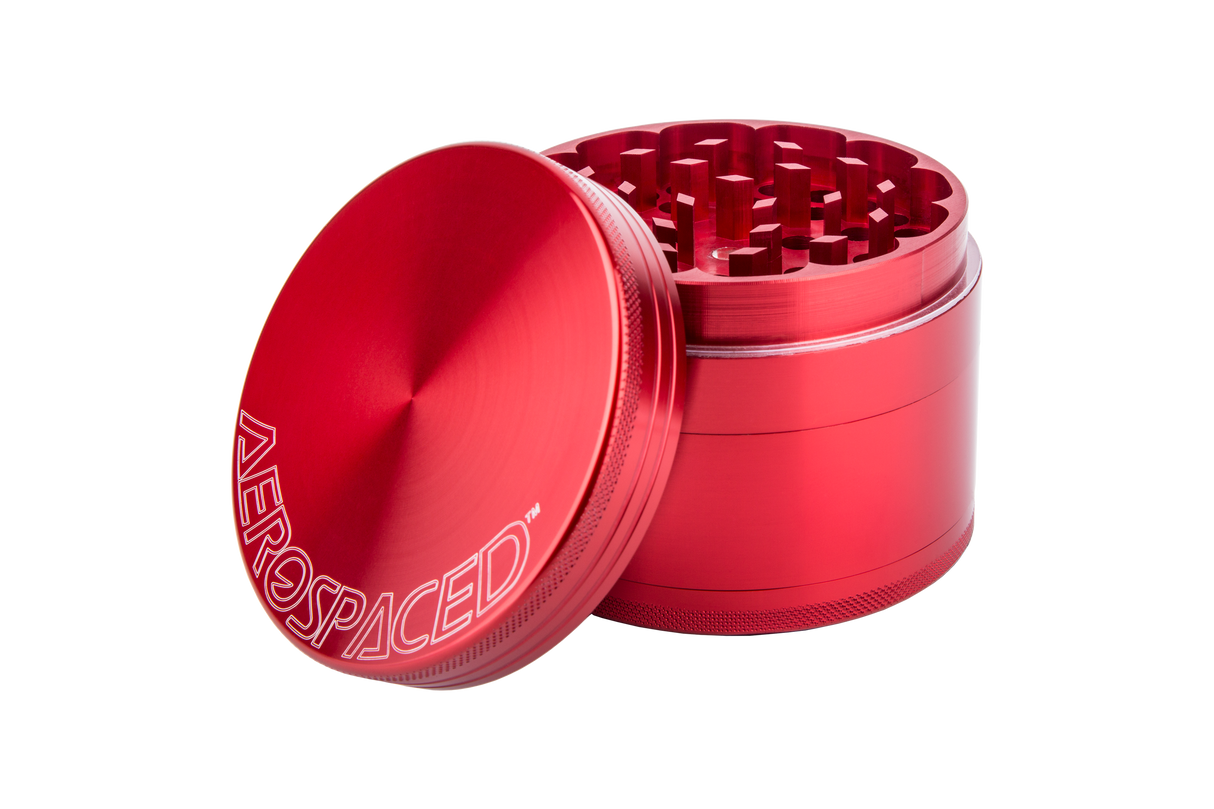 Aerospaced by Higher Standards red 4-piece aluminum grinder, 2.5" size, for dry herbs - angled view