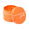 Cali Crusher OG Slick 4-Piece Nonstick Grinder in Orange, Open View Showing Sharp Teeth