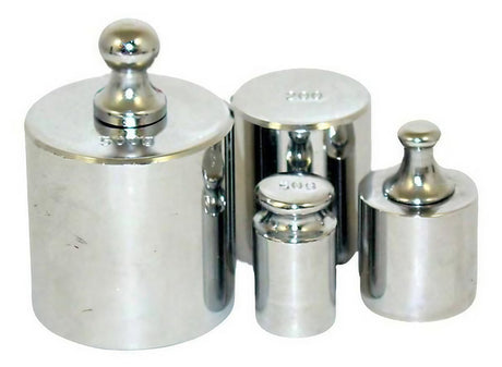 Set of three metal calibration weights, 50g, front view on a white background, essential for scale accuracy